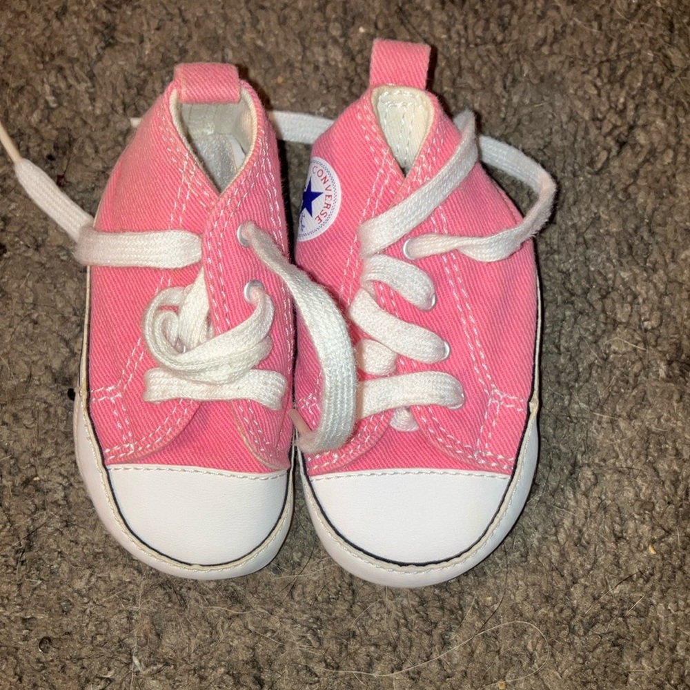 Pink and white Converse baby shoes